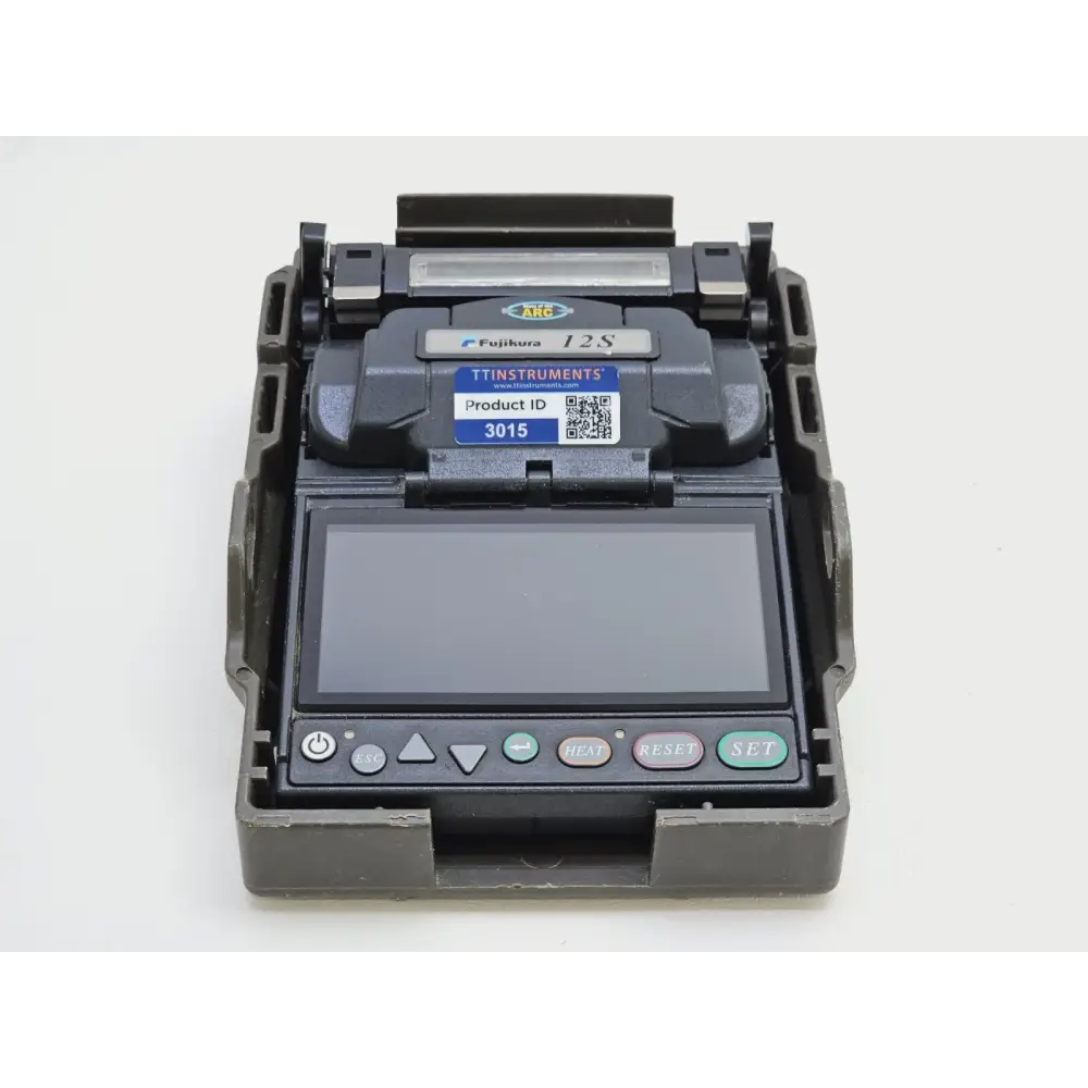 Fujikura 12S splicer top-down view showing fiber loading area and wind protector