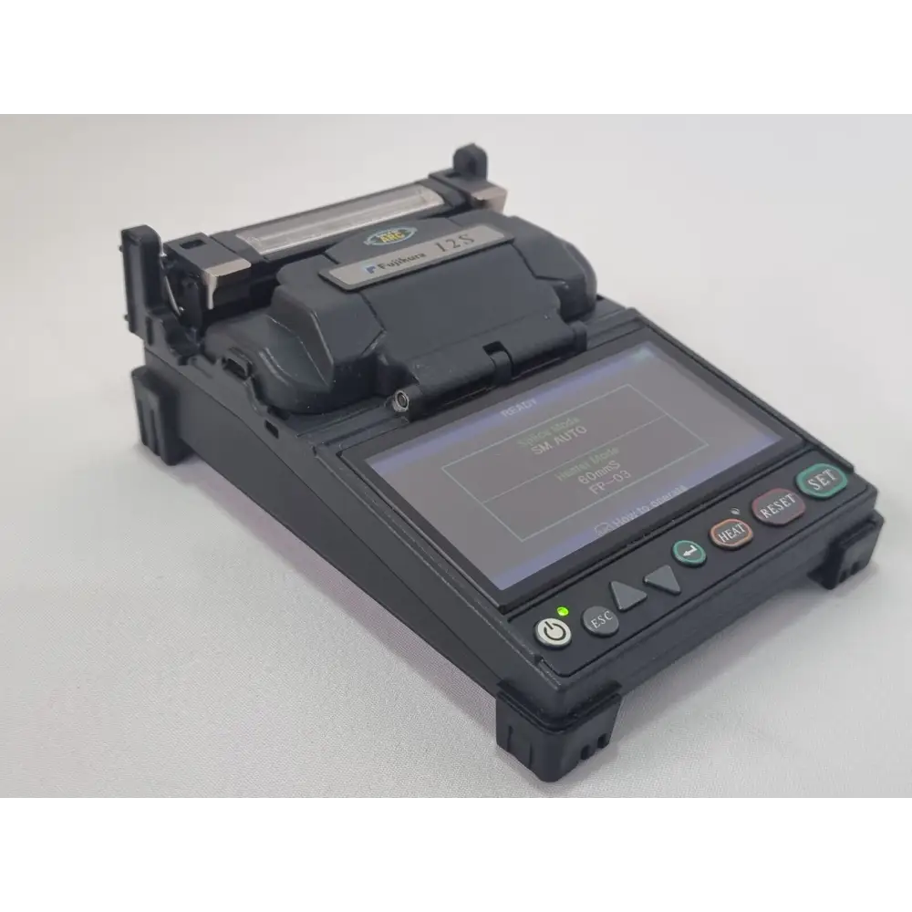 Fujikura FSM-12S splicer top-down view showing fibre loading channel