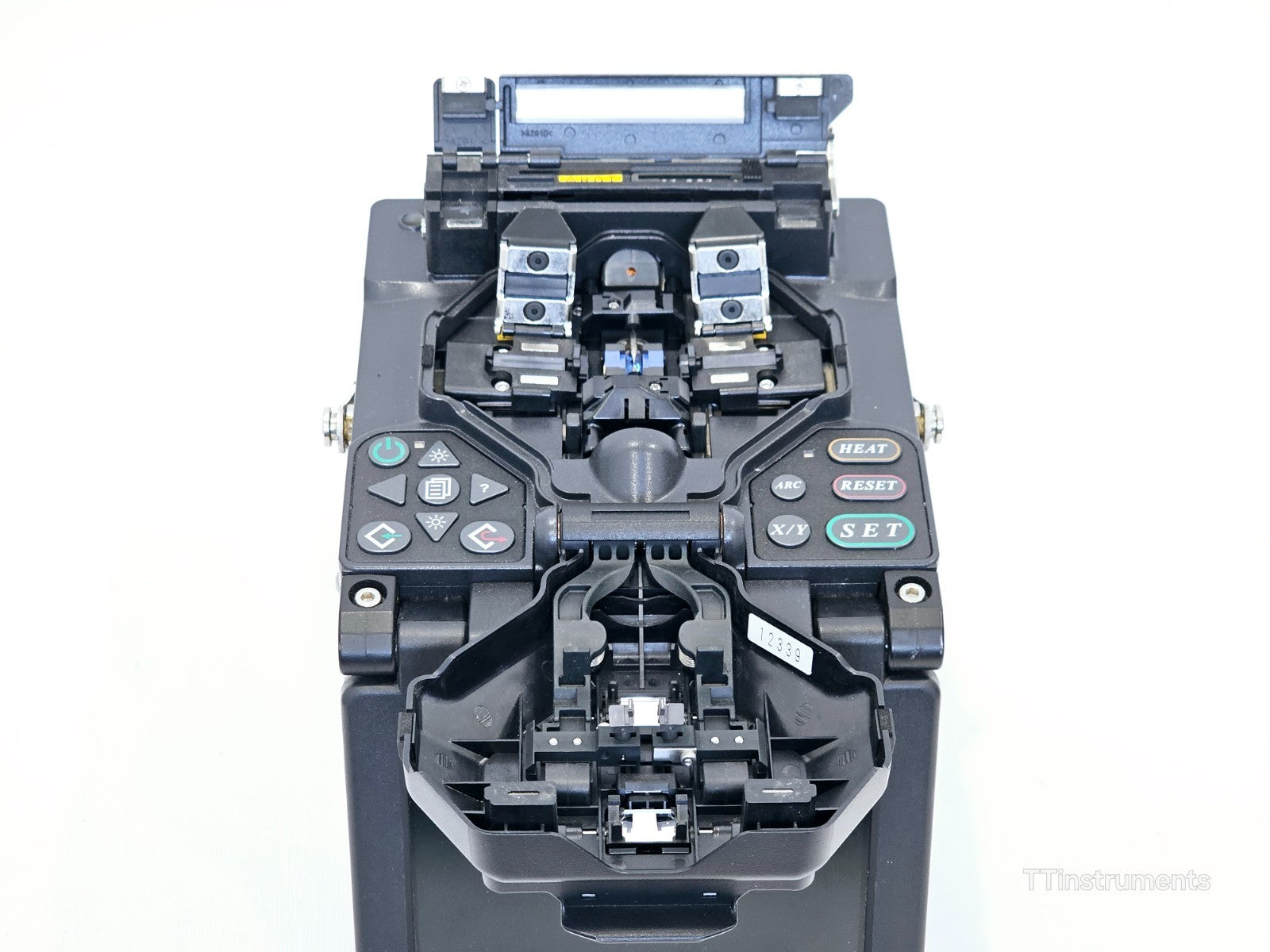 Fujikura 50S splicer detail view showing arc count reading and clamp mechanism