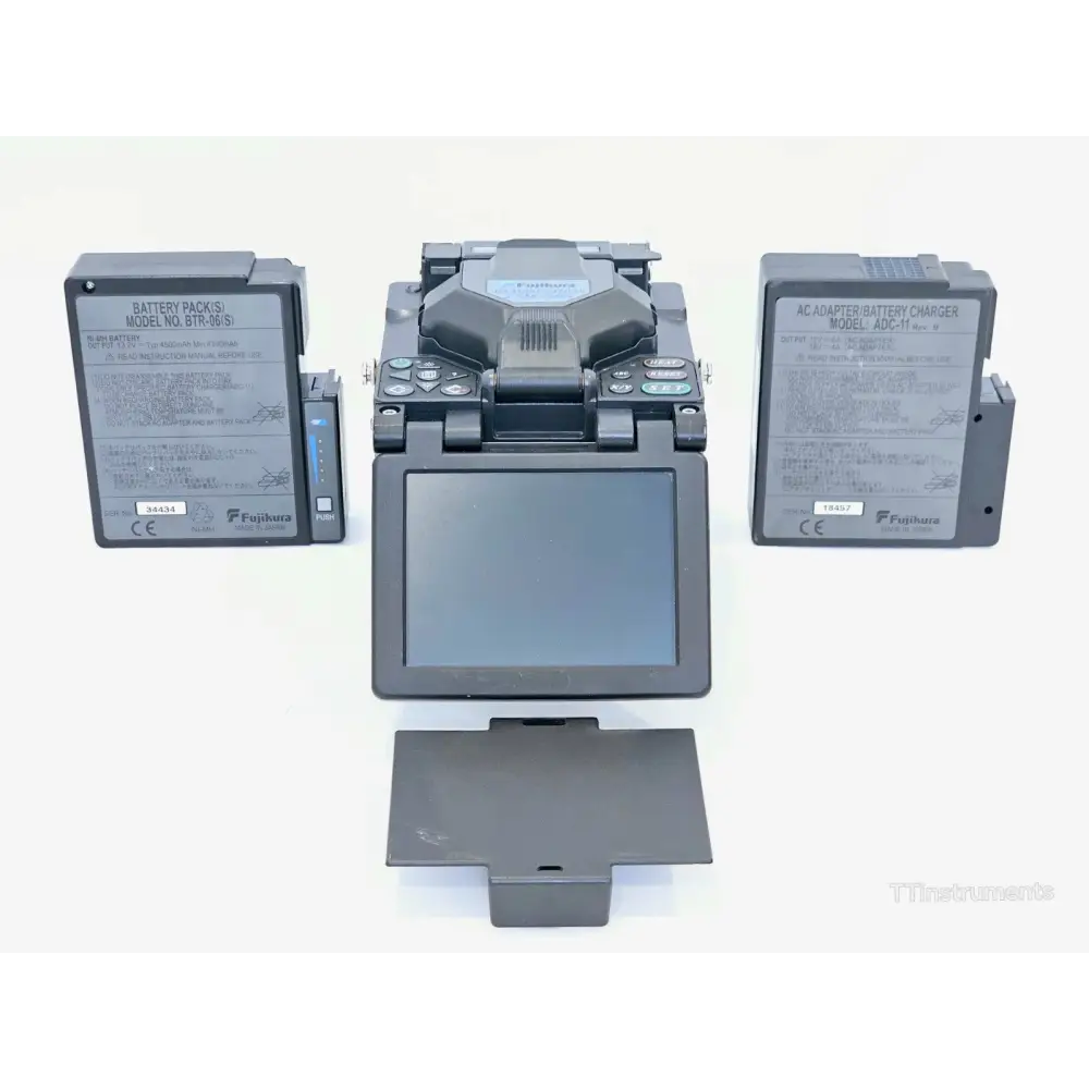 Fujikura 50S fusion splicer front view showing LCD display and fibre clamp assembly