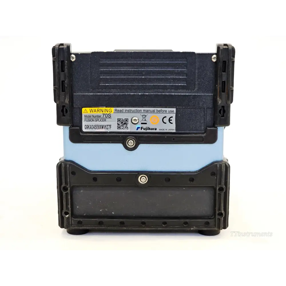 Fujikura FSM-70S fusion splicer rear view showing model 70S label, serial number G9KA045E8XWVYZ7F, and CE marking