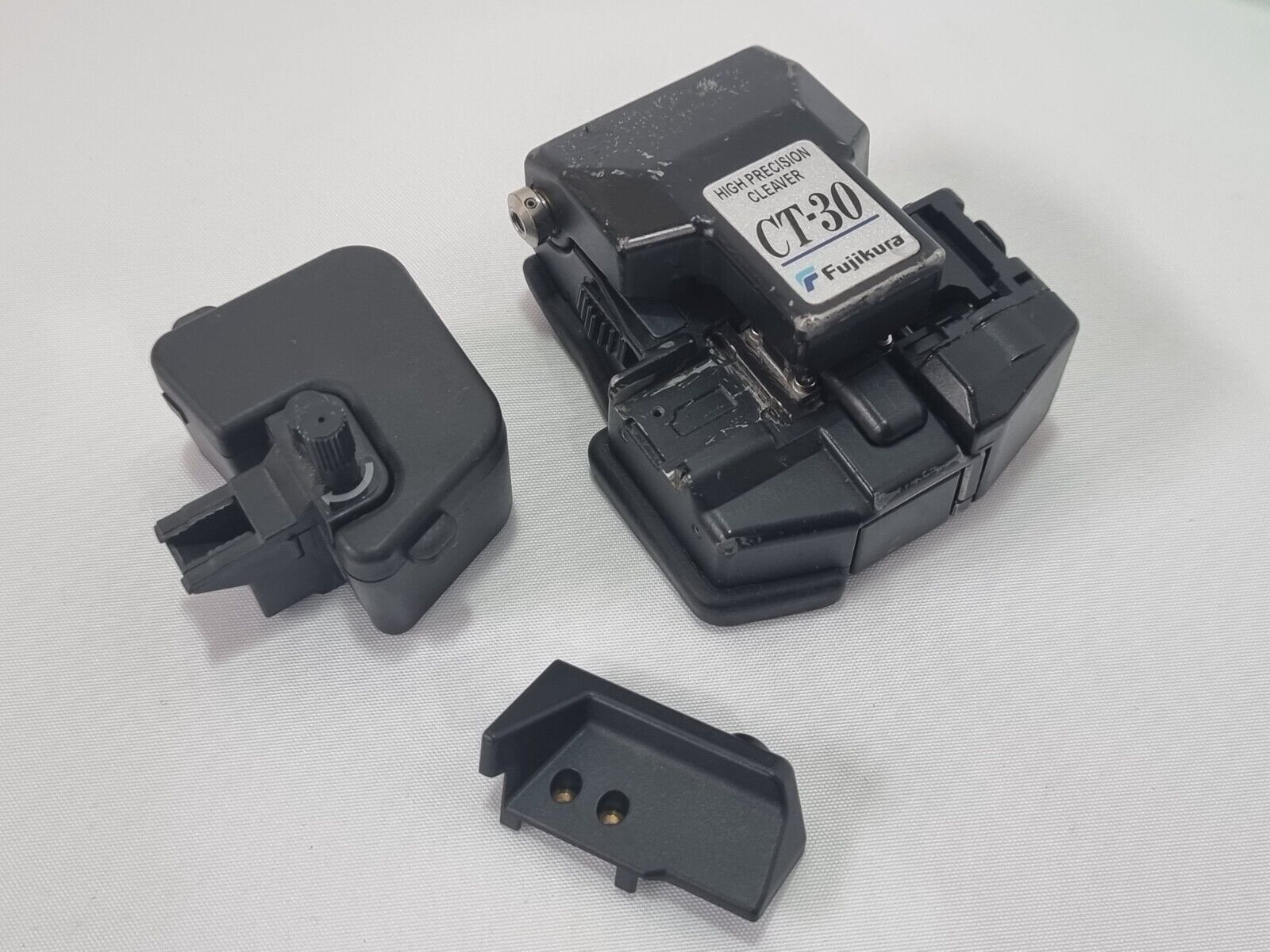 Fujikura CT-30 fiber optic cleaver stored in protective carry case