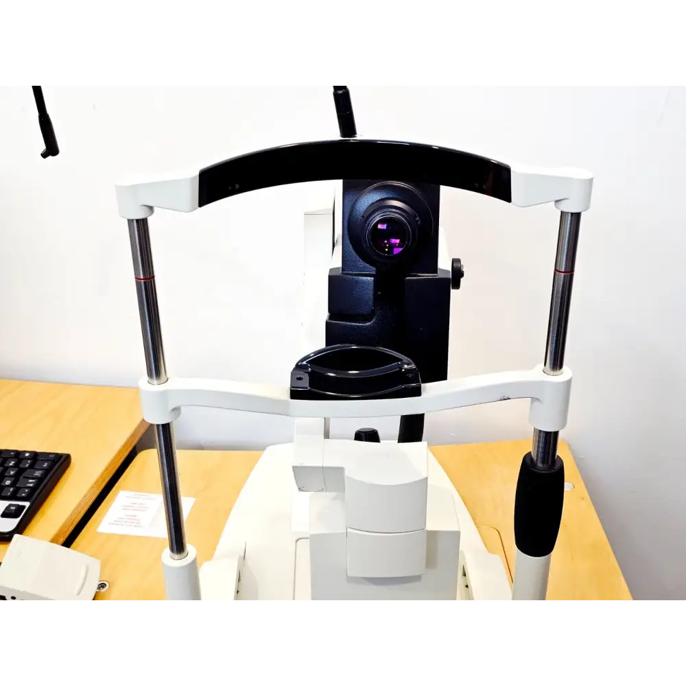 Heidelberg Engineering Spectralis HRA+OCT camera head front view showing objective lens, patient forehead rest frame and chin rest assembly