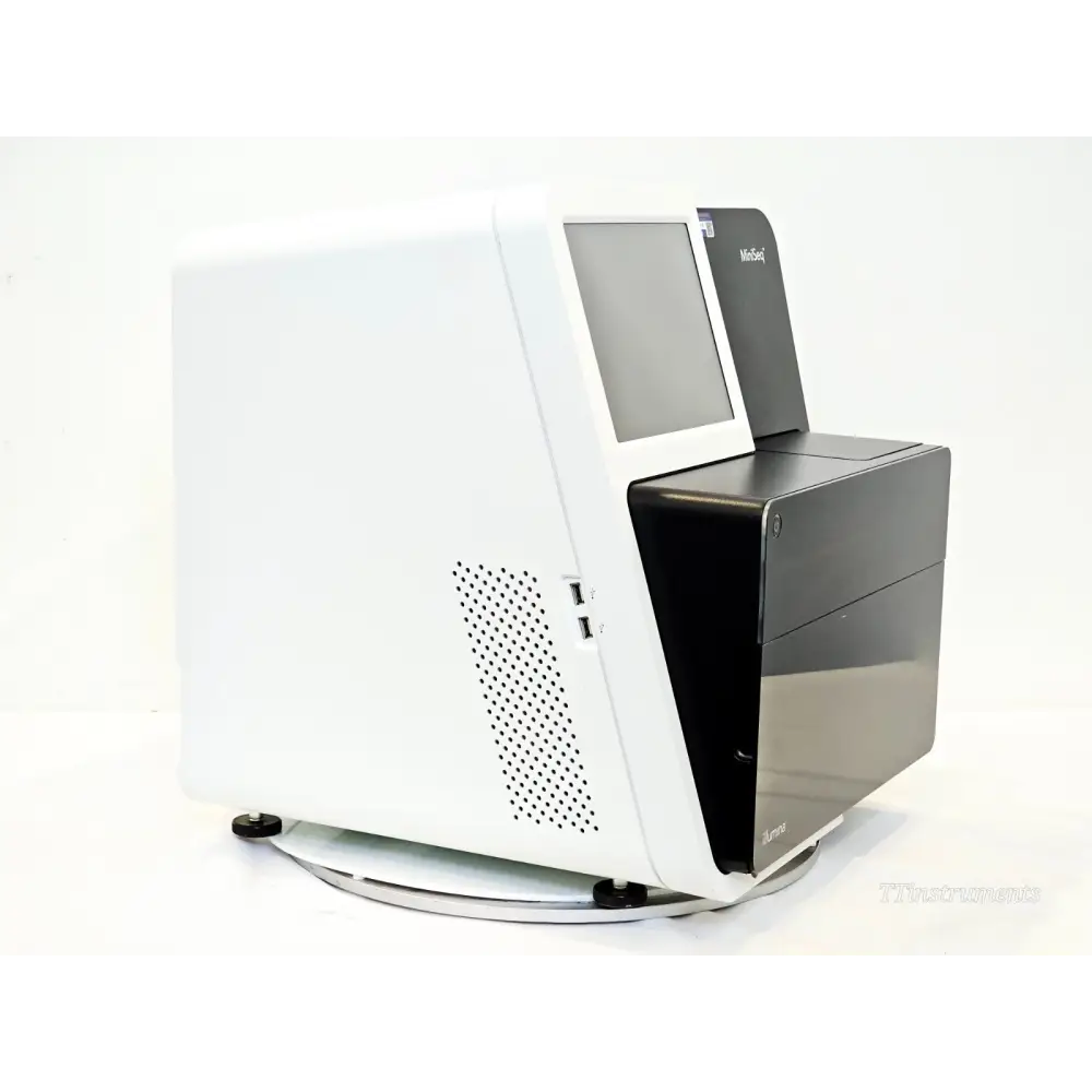 Illumina MiniSeq SY-420-1001 left side profile view showing USB ports, ventilation grille, and reagent compartment
