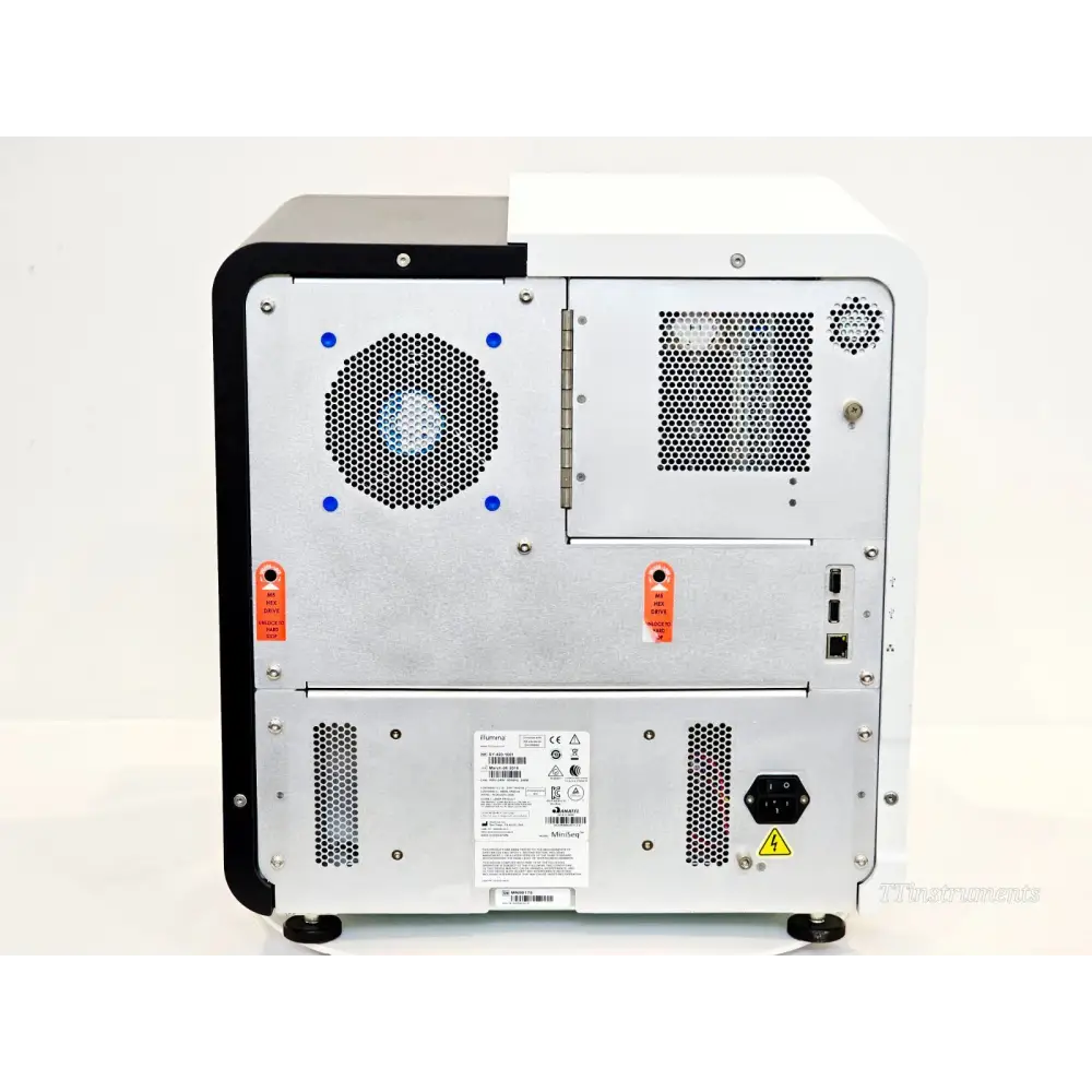 Illumina MiniSeq SY-420-1001 rear panel showing cooling fans, Ethernet port, USB ports, power inlet, and regulatory label