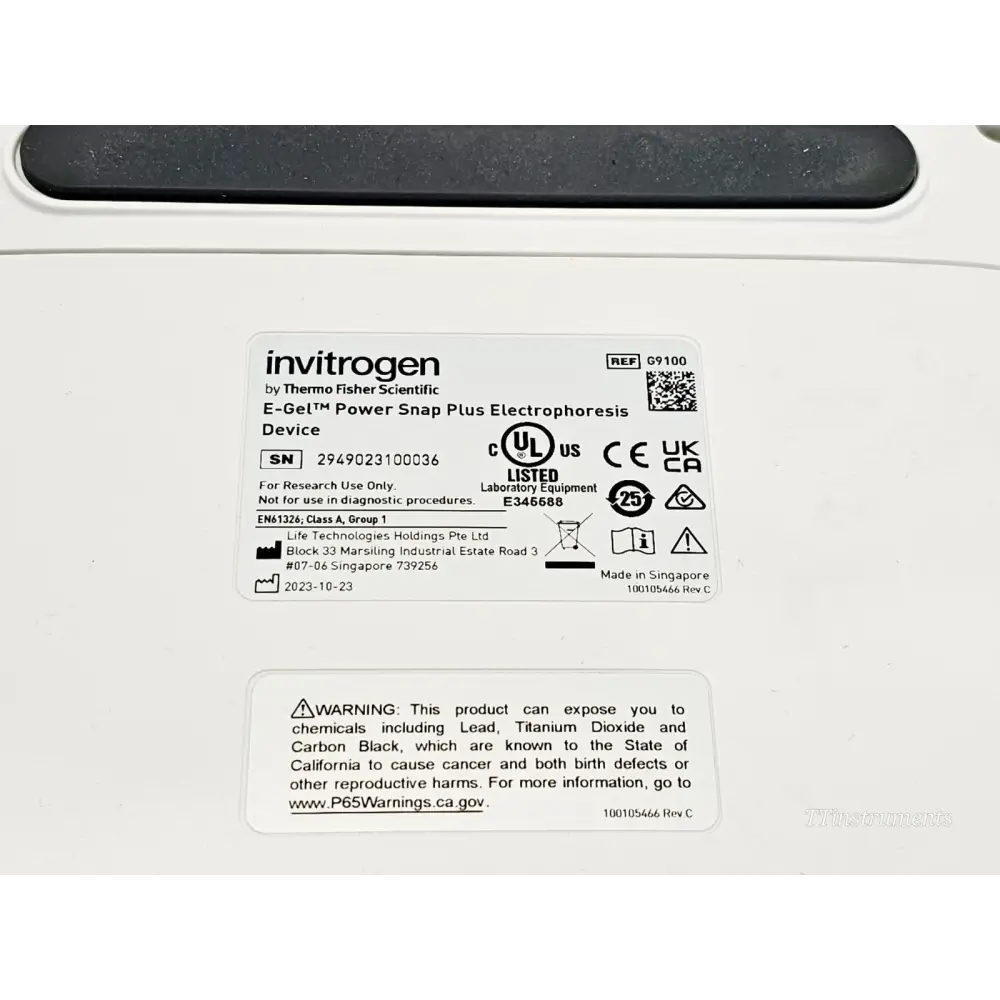 Invitrogen E-Gel Power Snap Plus G9100 underside showing serial label REF G9100 S/N 2949023100036 dated 2023