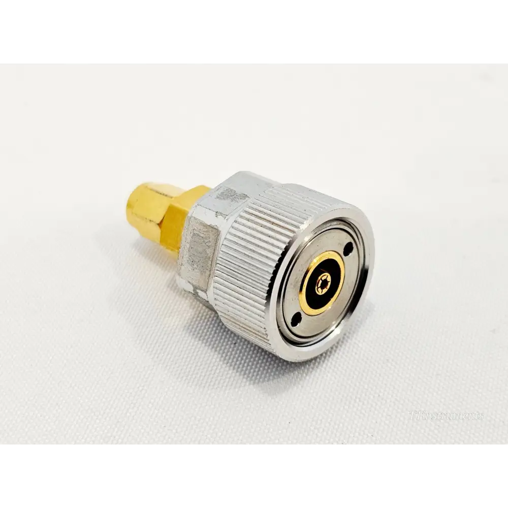 Keysight Agilent 1250-1746 APC-7 to 3.5mm Male SMA adapter angled view showing knurled body and APC-7 face