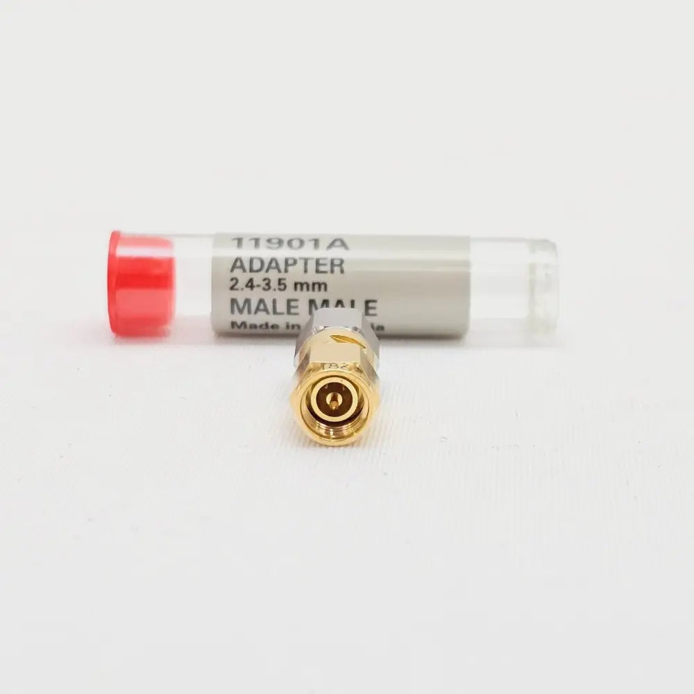 Keysight 11901A 3.5mm APC male connector end showing gold centre pin, front-on view with tube
