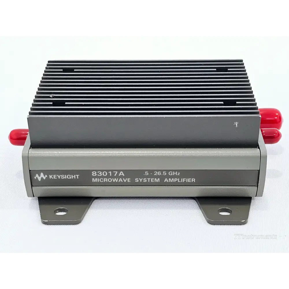 Keysight 83017A Microwave System Amplifier front face view showing model label, finned heatsink, red port caps