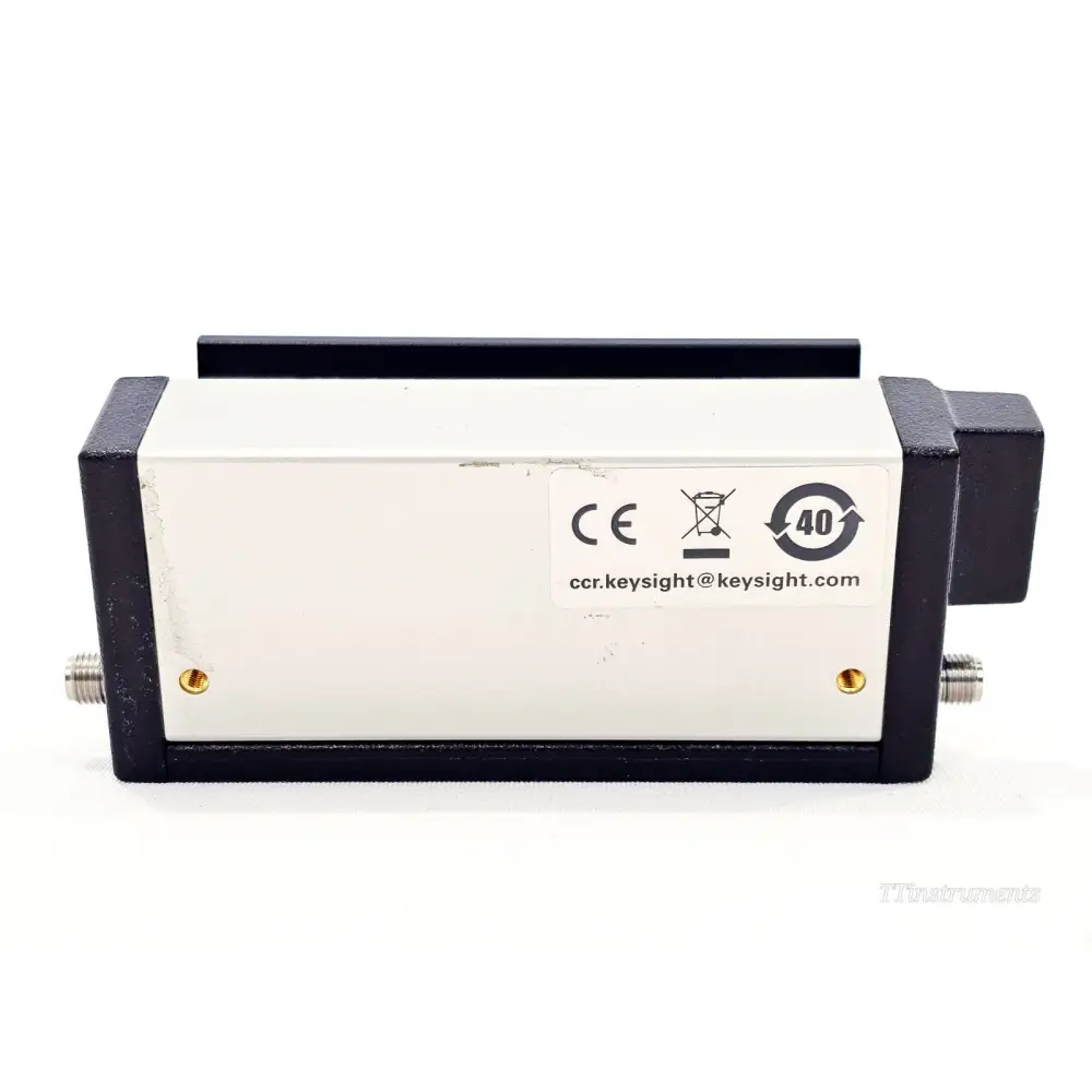 Keysight 84904L 11dB attenuator top view showing CE mark, WEEE symbol, and Keysight contact label on white panel