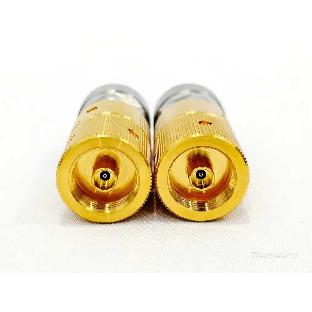 Keysight 85130-60014 2.4mm female connector end view of both adapters showing centre pin and gold body