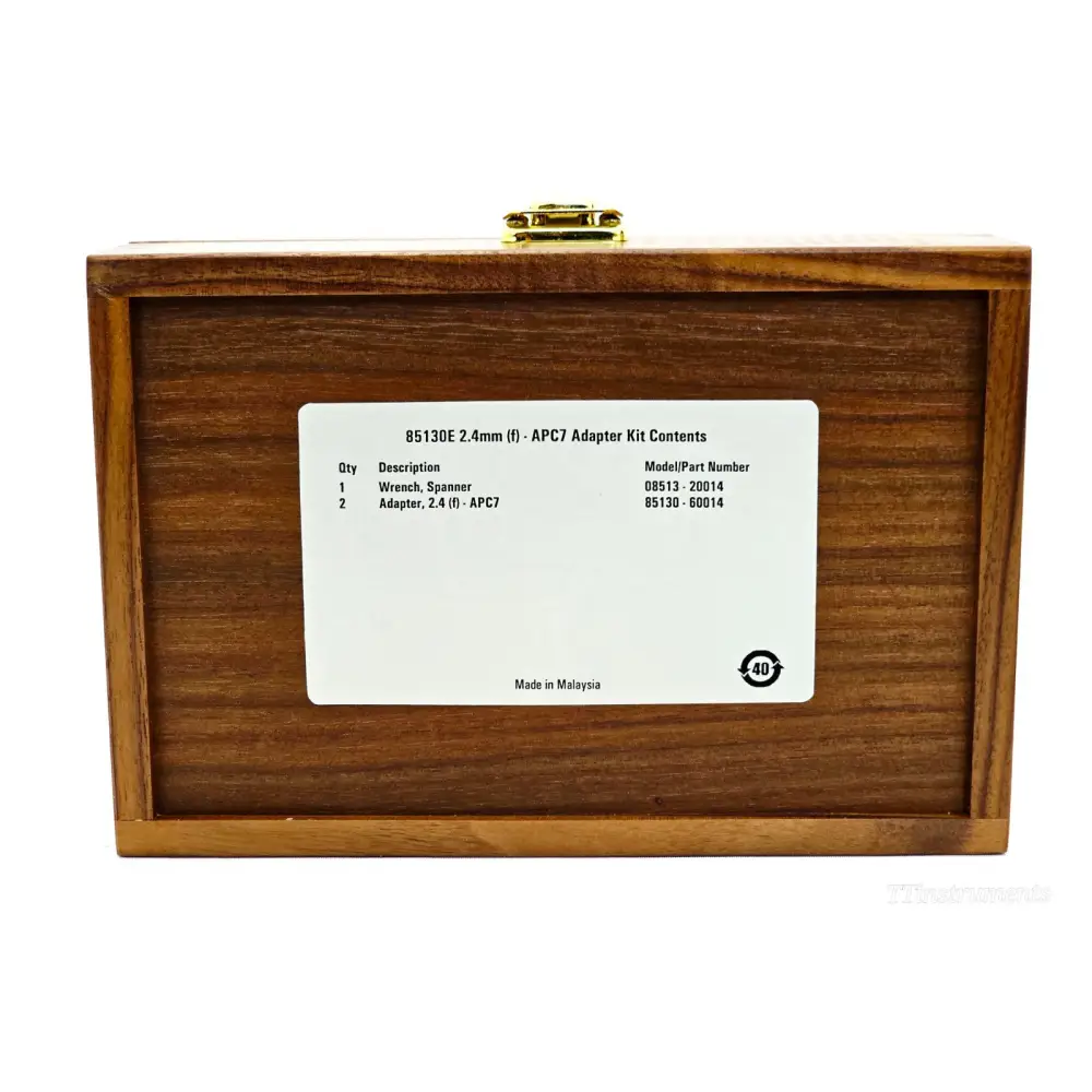 Keysight 85130E wooden case base showing contents label listing 2x 85130-60014 adapters and 08513-20014 wrench
