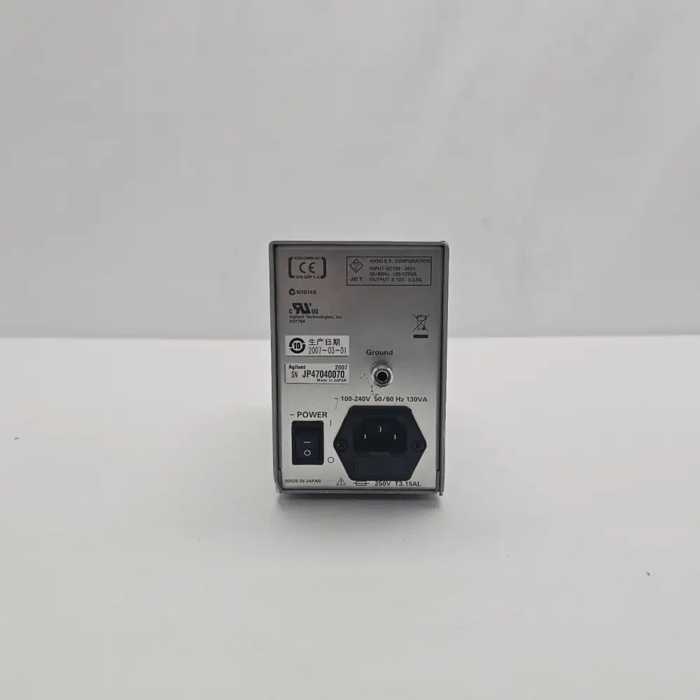 Agilent N2779A rear panel close-up showing serial number JP47040070, production date 2007-03-01 and compliance labels