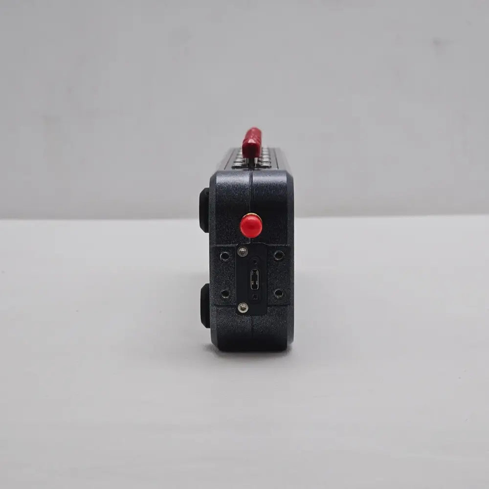 Keysight N7564A ECal Module left-end view showing Thru A port with red cap and USB Type-C interface port