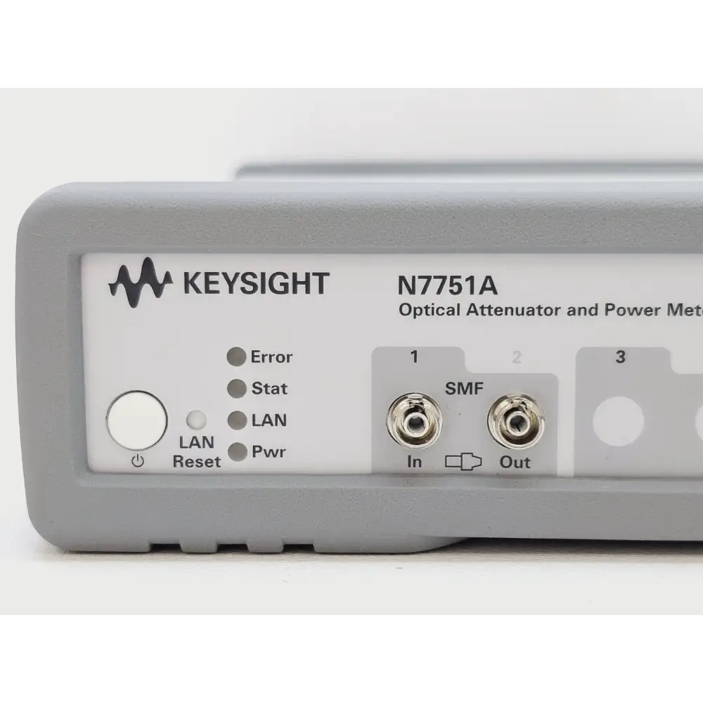 Keysight N7751A front panel detail close-up showing power/LAN/Error/Stat LEDs, LAN Reset button and SMF attenuator In/Out FC ports