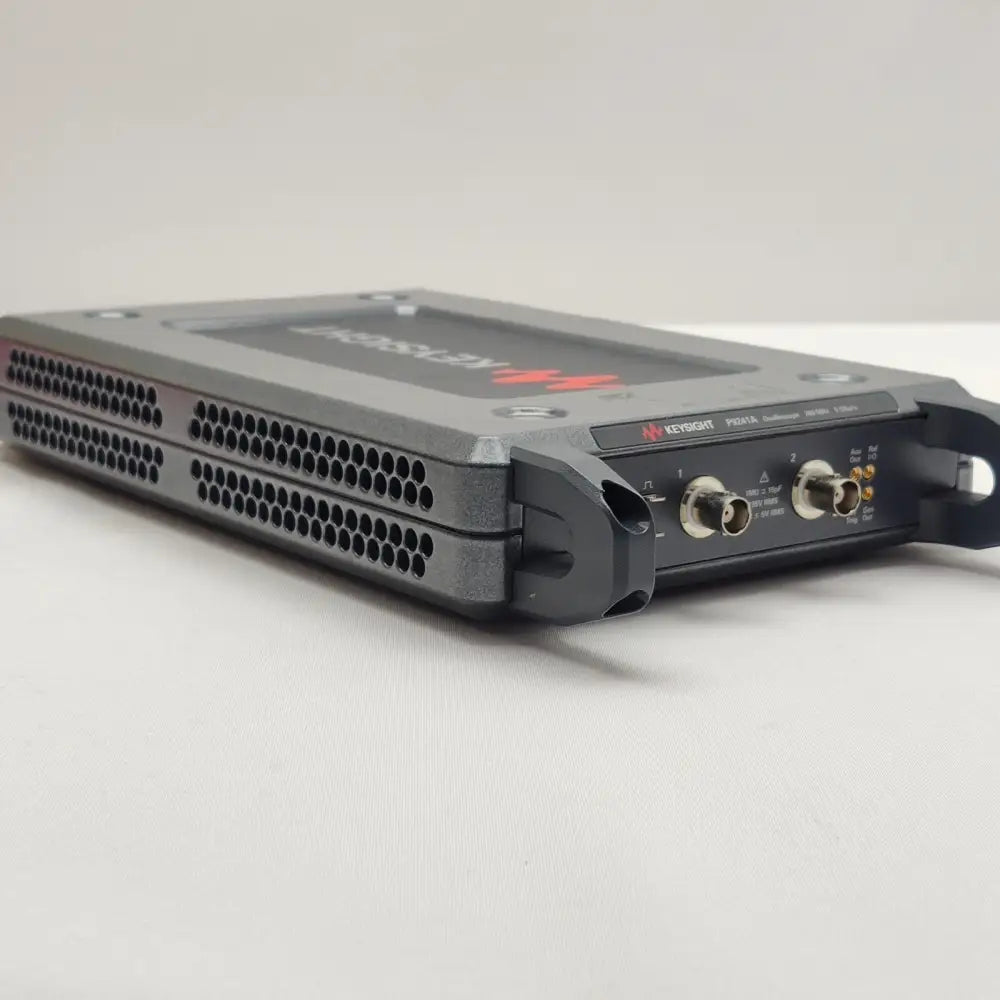 Keysight P9241A oscilloscope side and front view showing ventilation grilles, BNC inputs and SmartGrid label