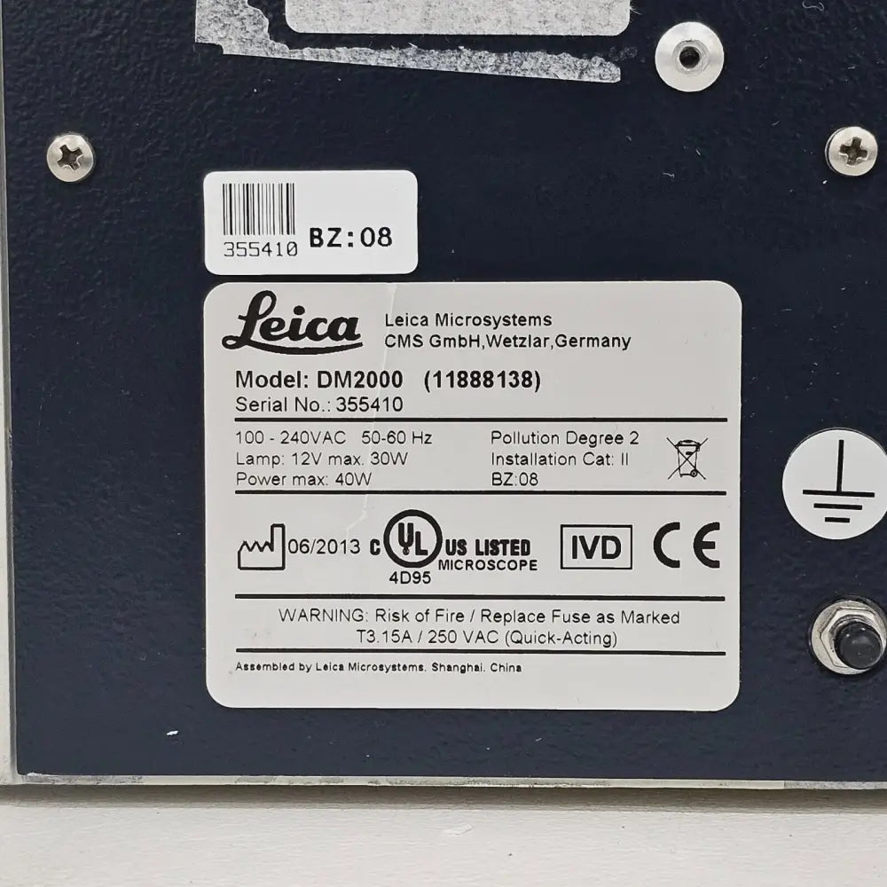 Leica DM2000 LED microscope top-down view of stage and nosepiece area