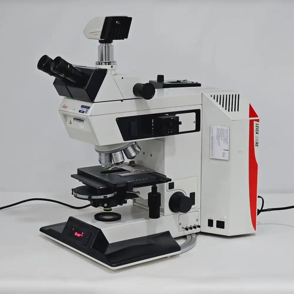 Leica DMRE HC microscope left side view with brightness control and stage adjustment