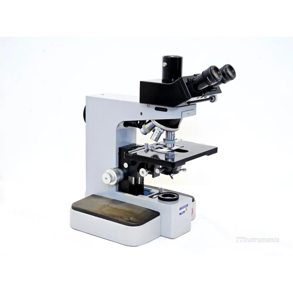 Leitz Orthoplan compound microscope right-side view showing trinocular head, NPL Fluotar objectives and mechanical stage