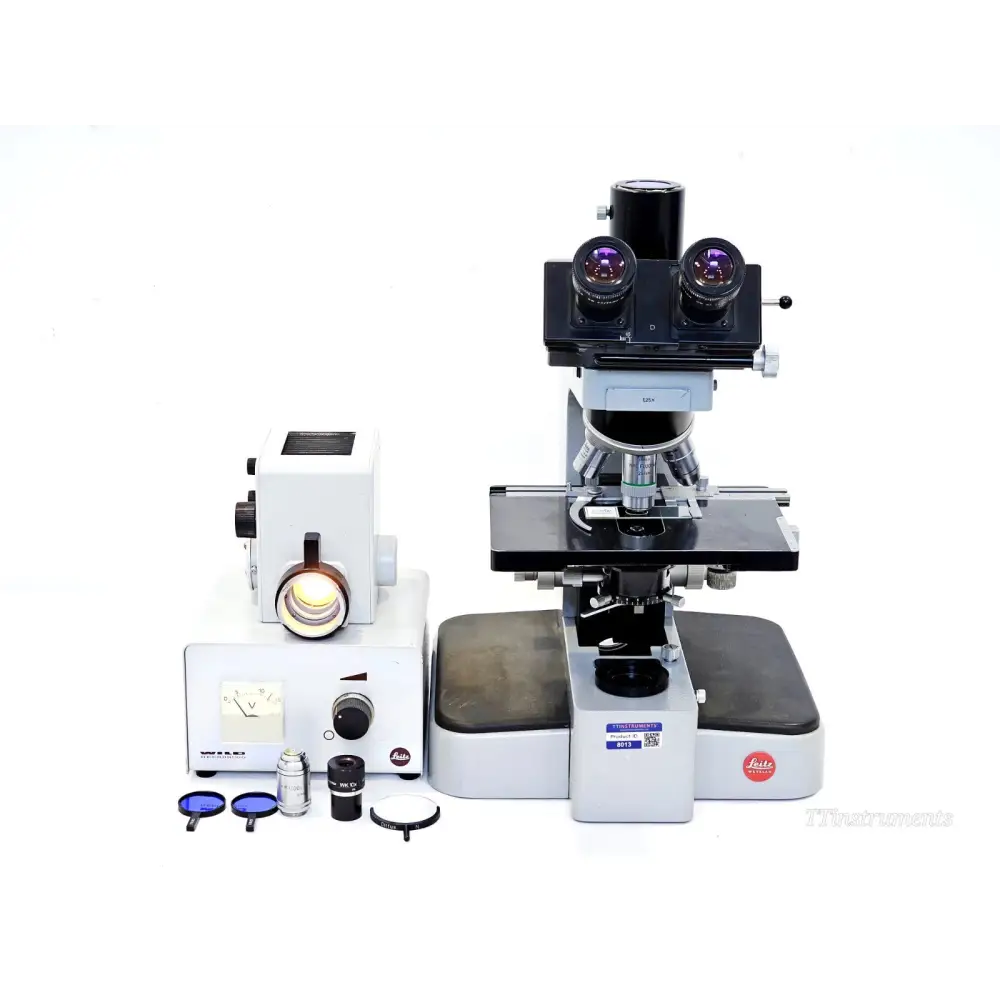 Leitz Orthoplan compound microscope with Wild Heerbrugg illuminator, 6 objectives, eyepieces and blue filters laid out