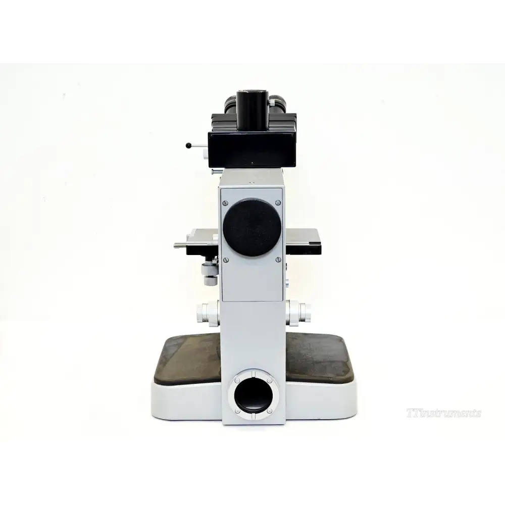 Leitz Orthoplan microscope rear view showing focus block, coarse/fine adjustment knobs, mechanical stage and condenser port