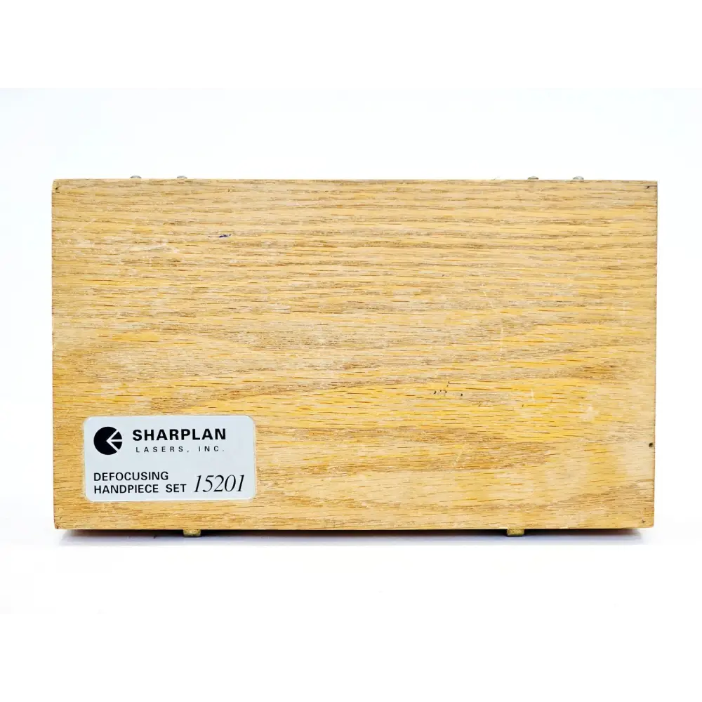 Sharplan Lasers Inc label on base of wooden case reading Defocusing Handpiece Set 15201