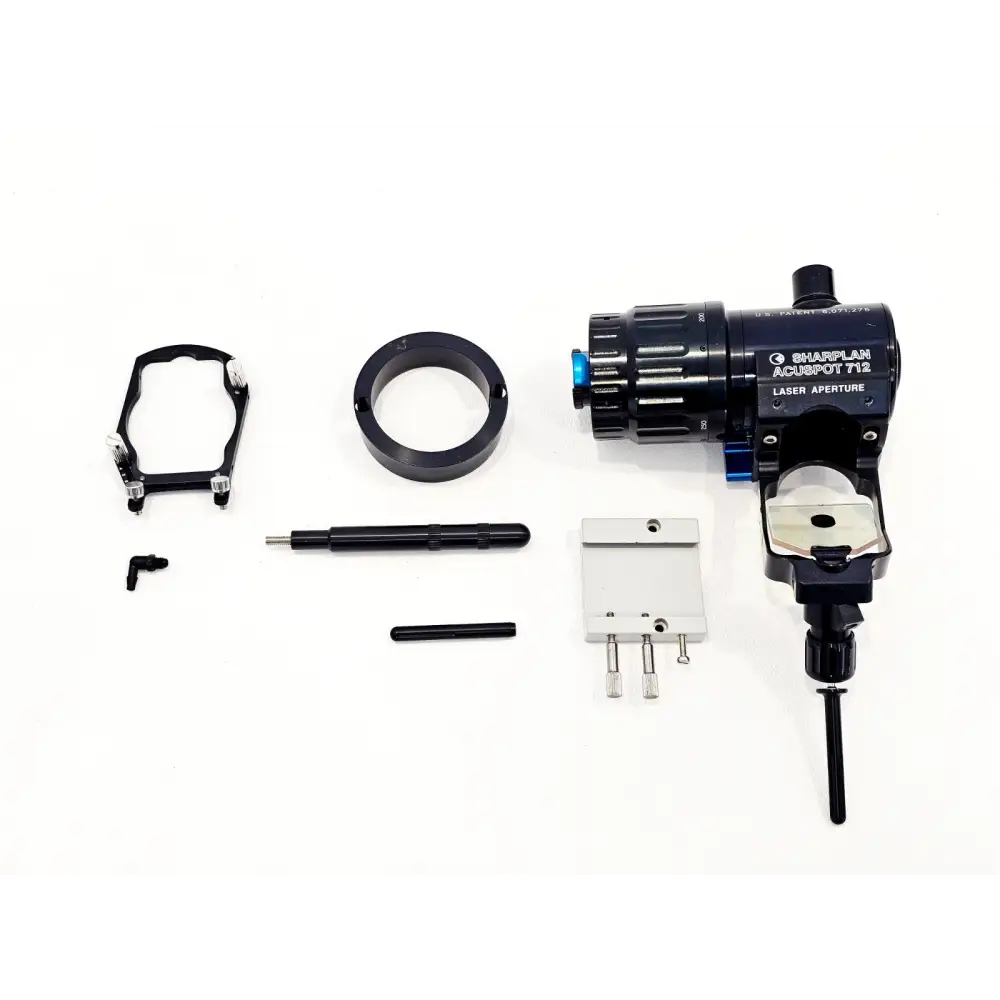 Sharplan AcuSpot 712 laser aperture unit with joystick arm, mounting bracket, ring adapter and tools on white background
