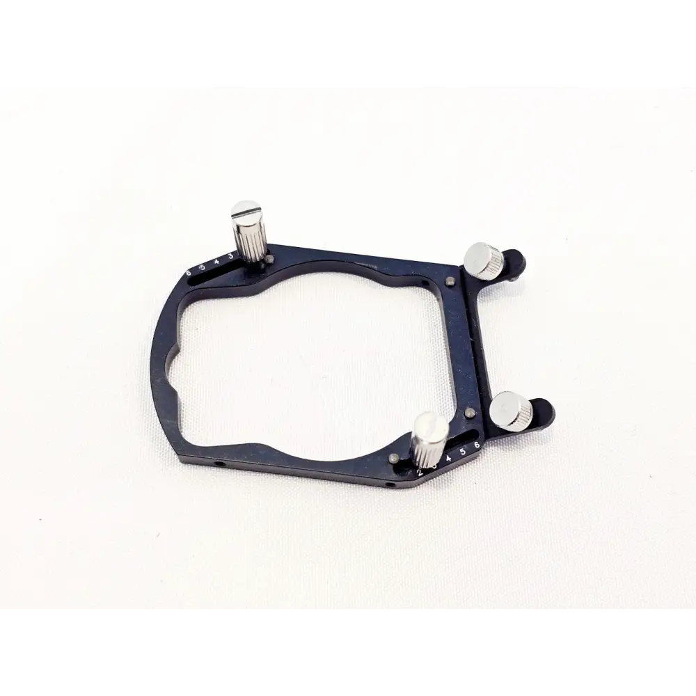 Sharplan AcuSpot 712 black clamp frame bracket with three adjustable knurled thumbscrews and graduated scale markings