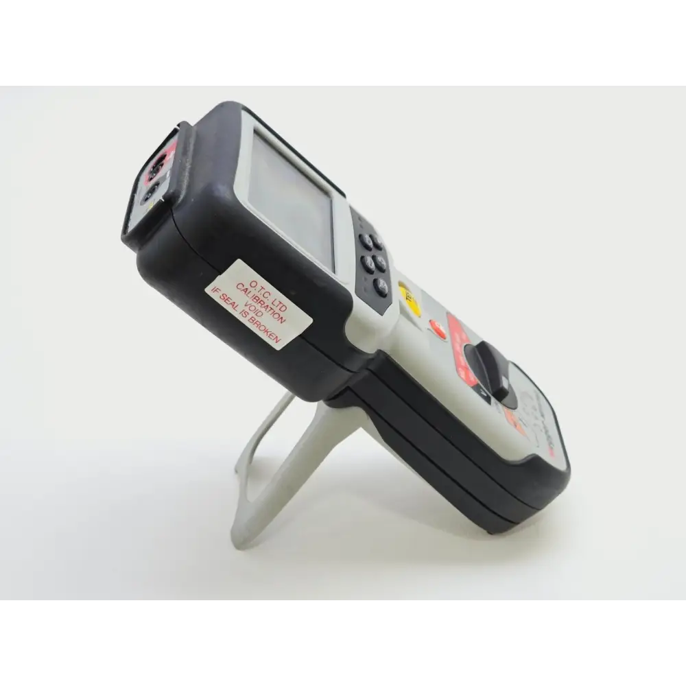 Megger MIT410/2 display close-up showing digital insulation resistance readout and analogue arc scale