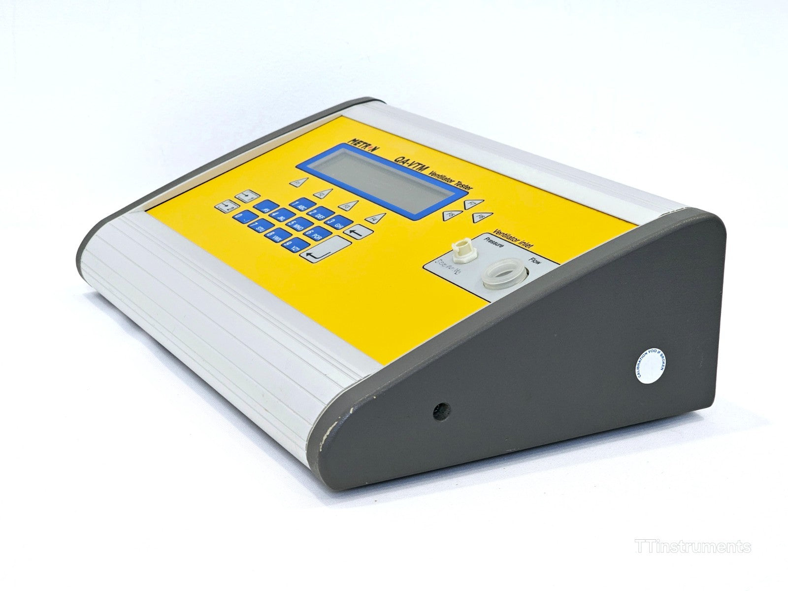 Metron QA-VTM Ventilator Tester right-side angled view showing ventilator inlet pressure and flow ports
