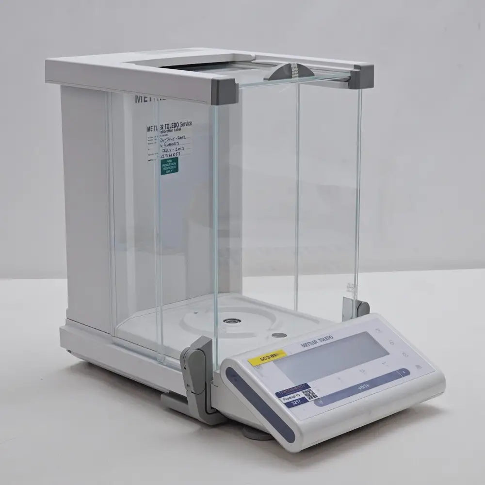 Mettler Toledo NewClassic MS105DU balance shown with supplied accessories