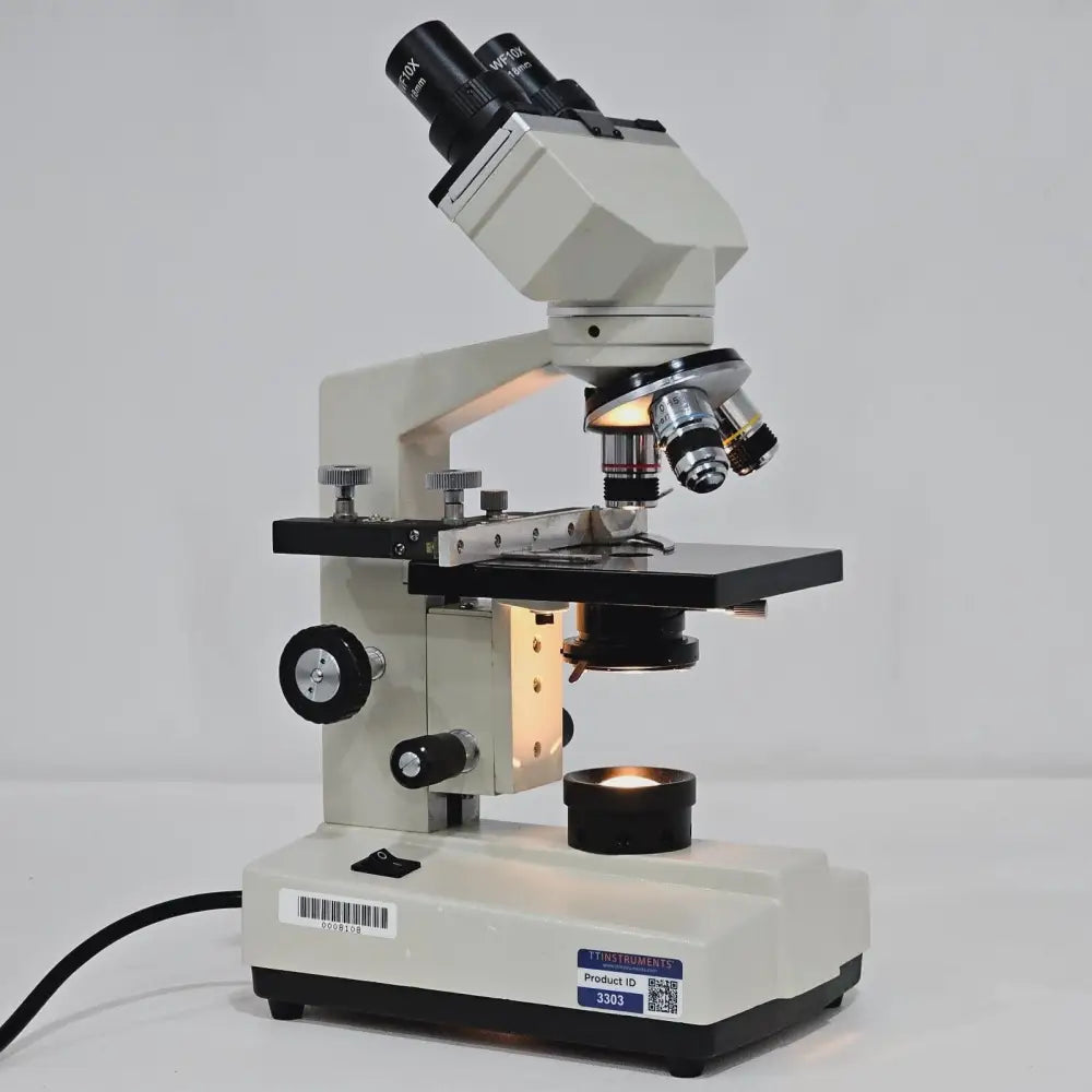 Compound laboratory microscope with 4x, 10x and 40x achromatic objectives on revolving nosepiece