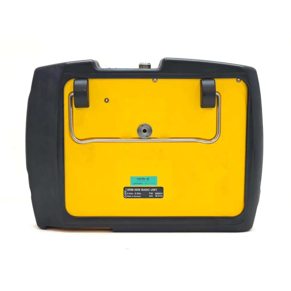 Narda SRM-3006 rear panel showing yellow body, Narda calibration sticker dated 08.03.2022, SRM-3006 Basic Unit label S/N M-0142