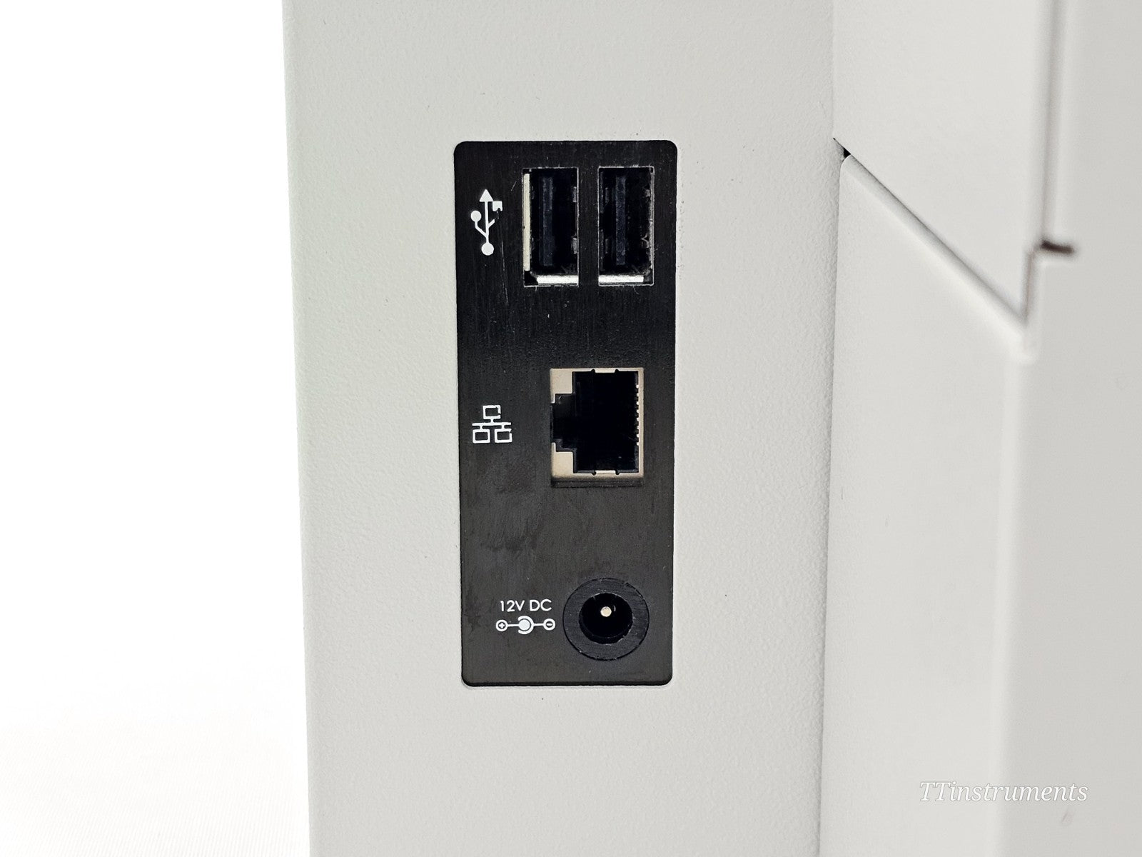 Nexcelom Cellometer Auto 2000 rear panel close-up showing dual USB ports, RJ45 Ethernet, and 12V DC barrel connector