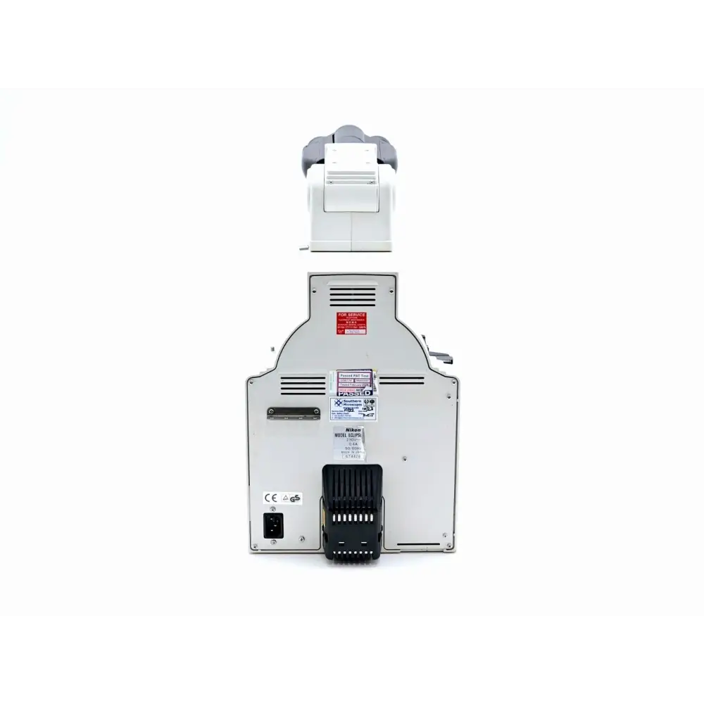 Nikon Eclipse E400 microscope left side view displaying illumination and coarse focus mechanism