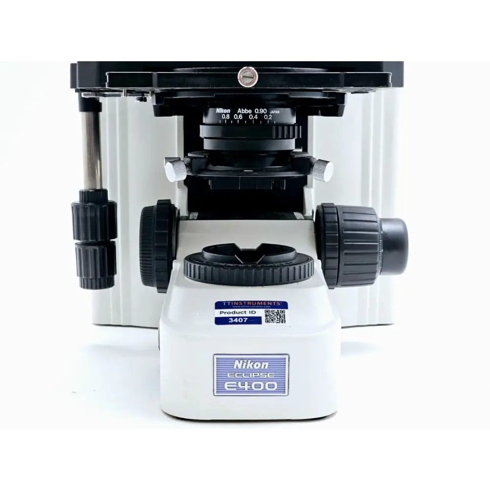 Nikon Eclipse E400 included accessories laid out alongside microscope body