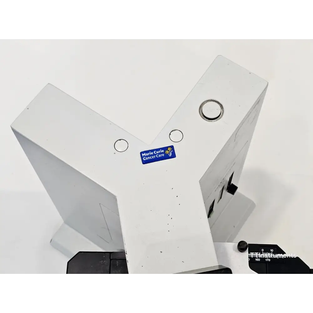 Olympus BX40 five-position inward-facing nosepiece with Plan objectives installed