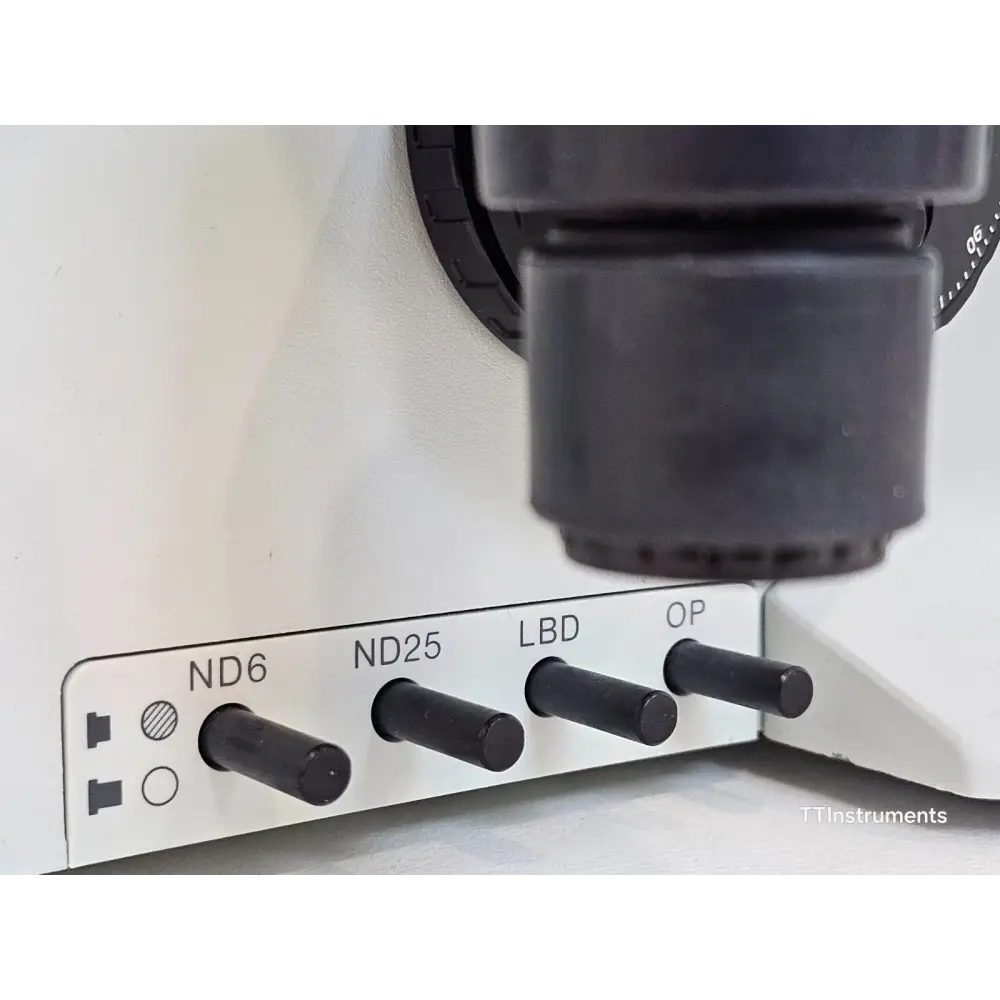 Olympus BX51TF microscope stage showing mechanical X-Y translation controls