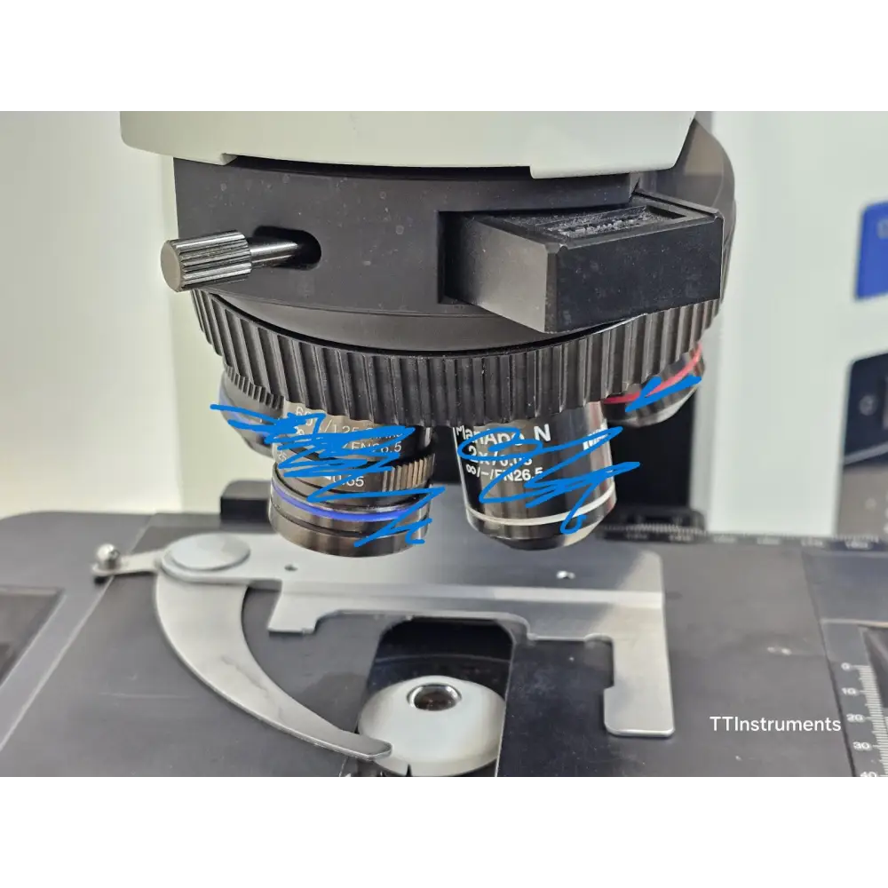 Olympus BX51TF base showing halogen lamp housing and transmitted light illumination port