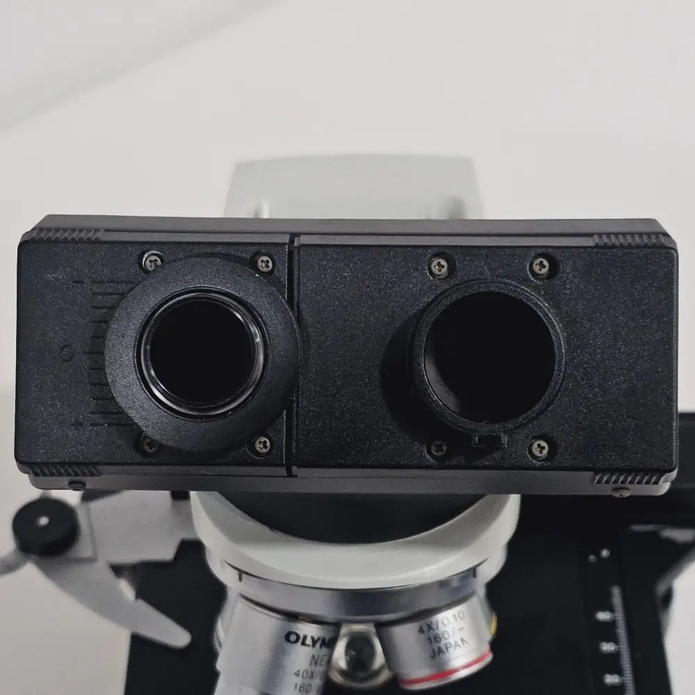 Olympus CH20 mechanical stage and quadruple nosepiece with NEA objectives fitted