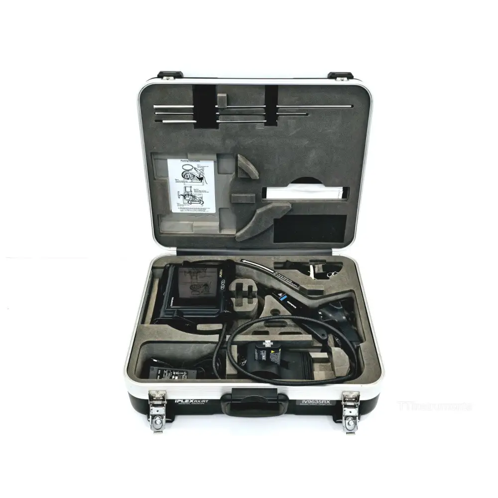 Olympus iPlex RX IV9635RX aluminium carry case open showing main unit, probe, batteries and accessories in foam