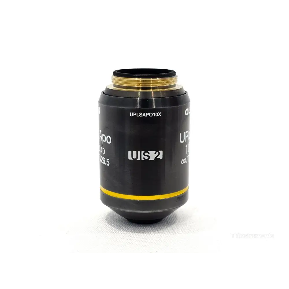 Olympus UPLSAPO10X objective showing engraved 10x/0.40 infinity FN26.5 markings on barrel