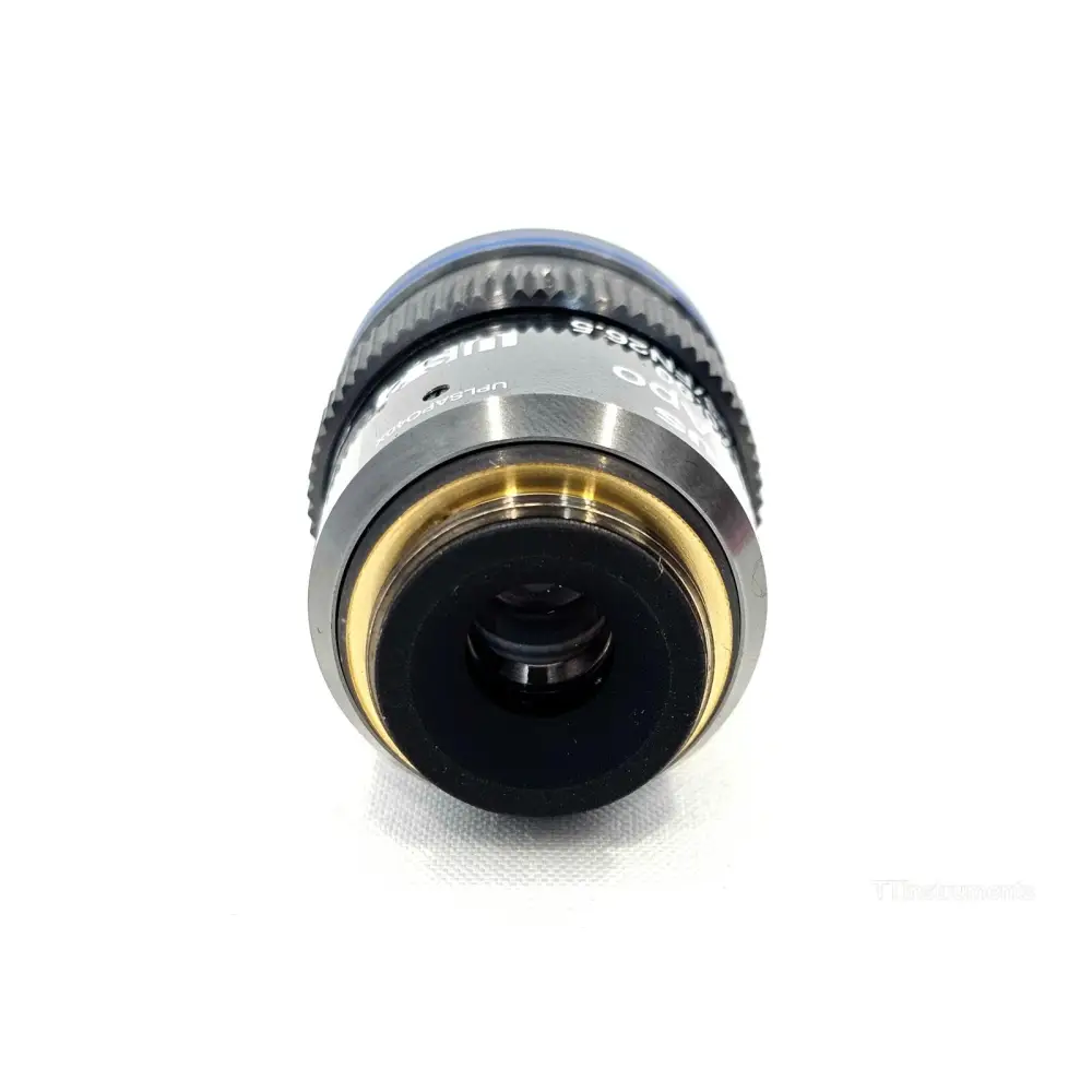 Olympus UPlanSApo UPLSAPO40X 40x objective bottom view showing front lens element with gold-anodised retaining ring