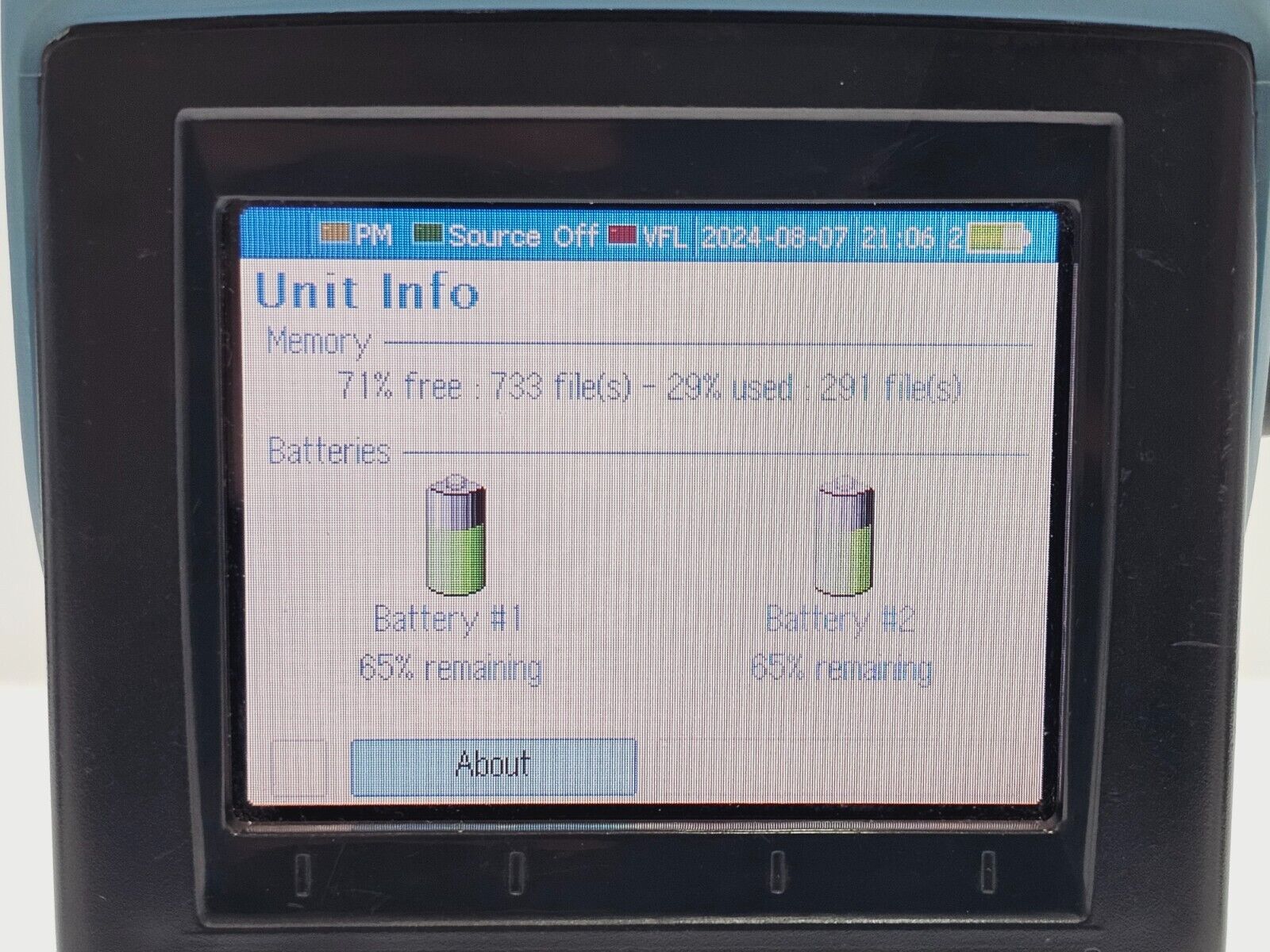 EXFO FOT-930 MaxTester II showing data logging and report storage menu screen