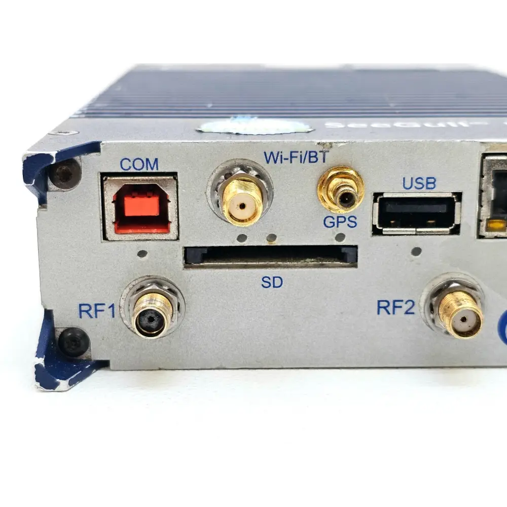 PCTEL SeeGull IBflex close-up of connector panel showing COM, Wi-Fi/BT, GPS SMA, USB, SD card slot, RF1 and RF2