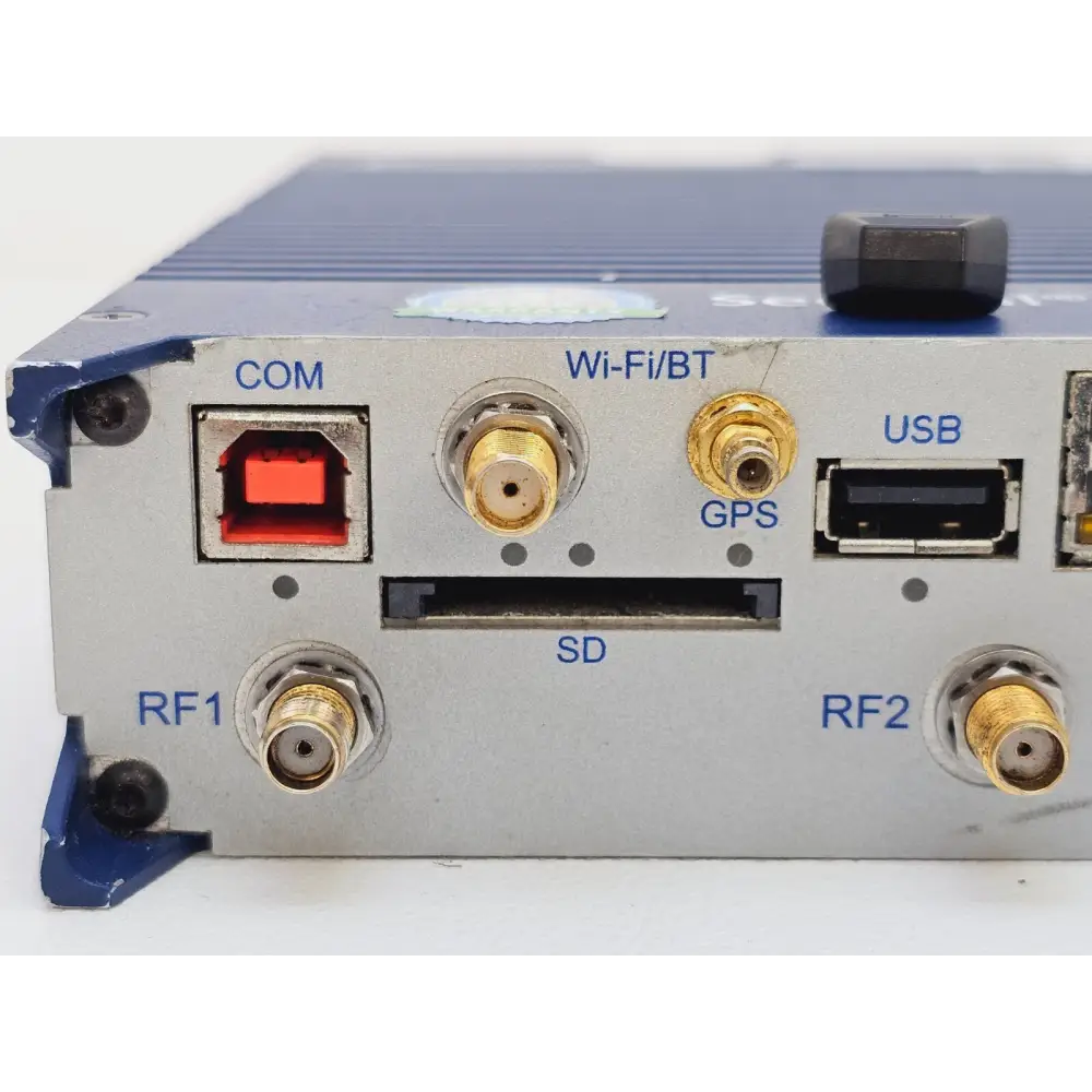 PCTEL SeeGull IBflex close-up of connector panel showing COM, Wi-Fi/BT SMA, GPS SMA, USB, SD card slot, RF1 and RF2 SMA ports