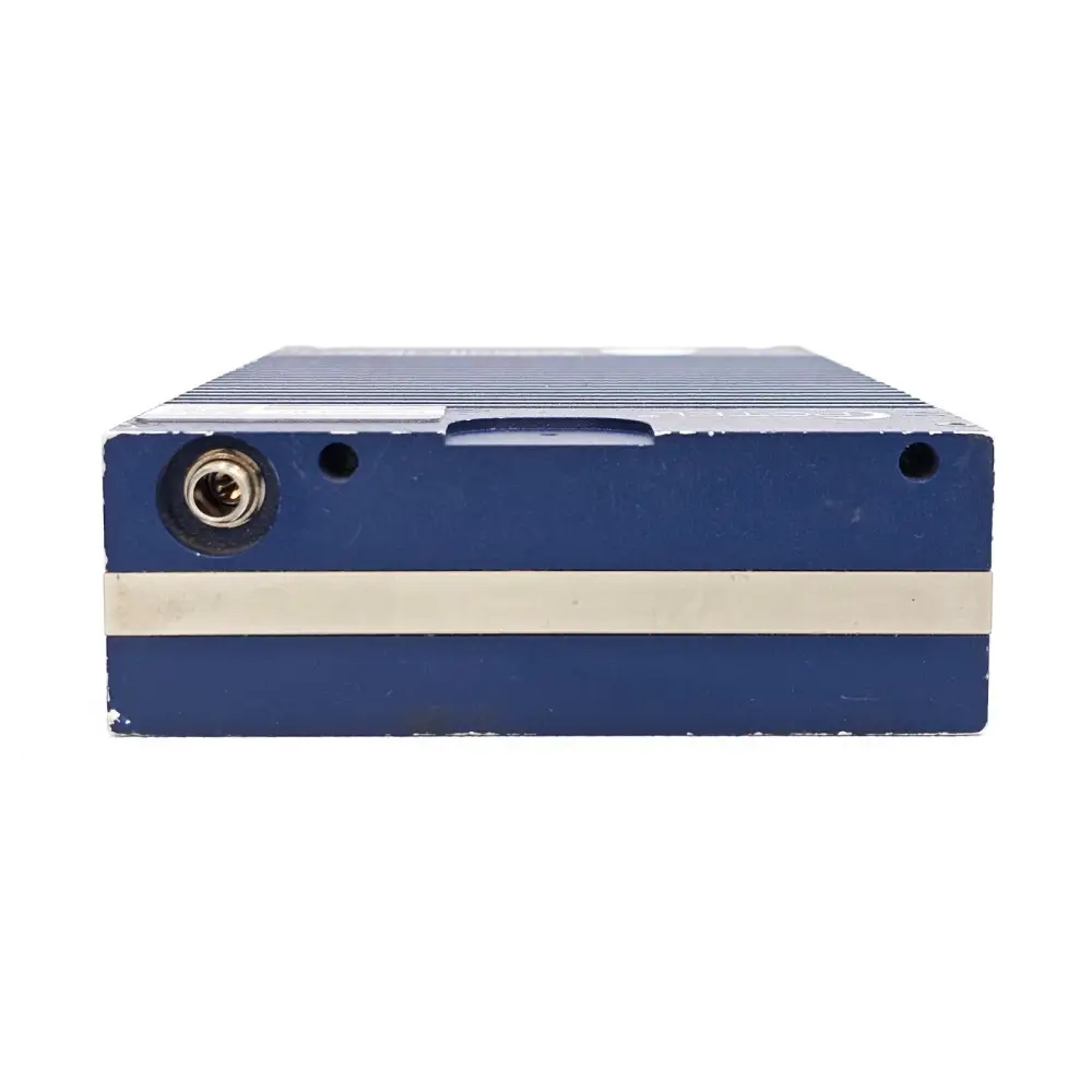 PCTEL SeeGull IBflex left side view showing DC power input connector and blue ribbed aluminium housing with paint wear