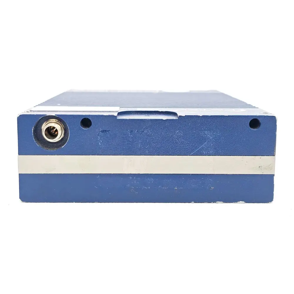 PCTEL SeeGull IBflex 08900S side view showing SMA RF port, blue finned aluminium chassis with cosmetic wear marks