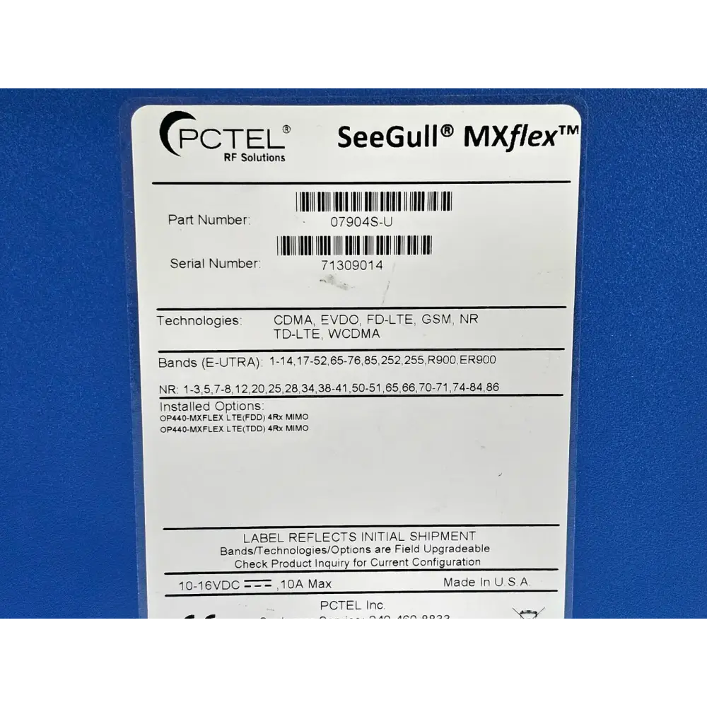 Close-up of PCTEL MXflex RF SMA antenna port connectors on scanning receiver chassis