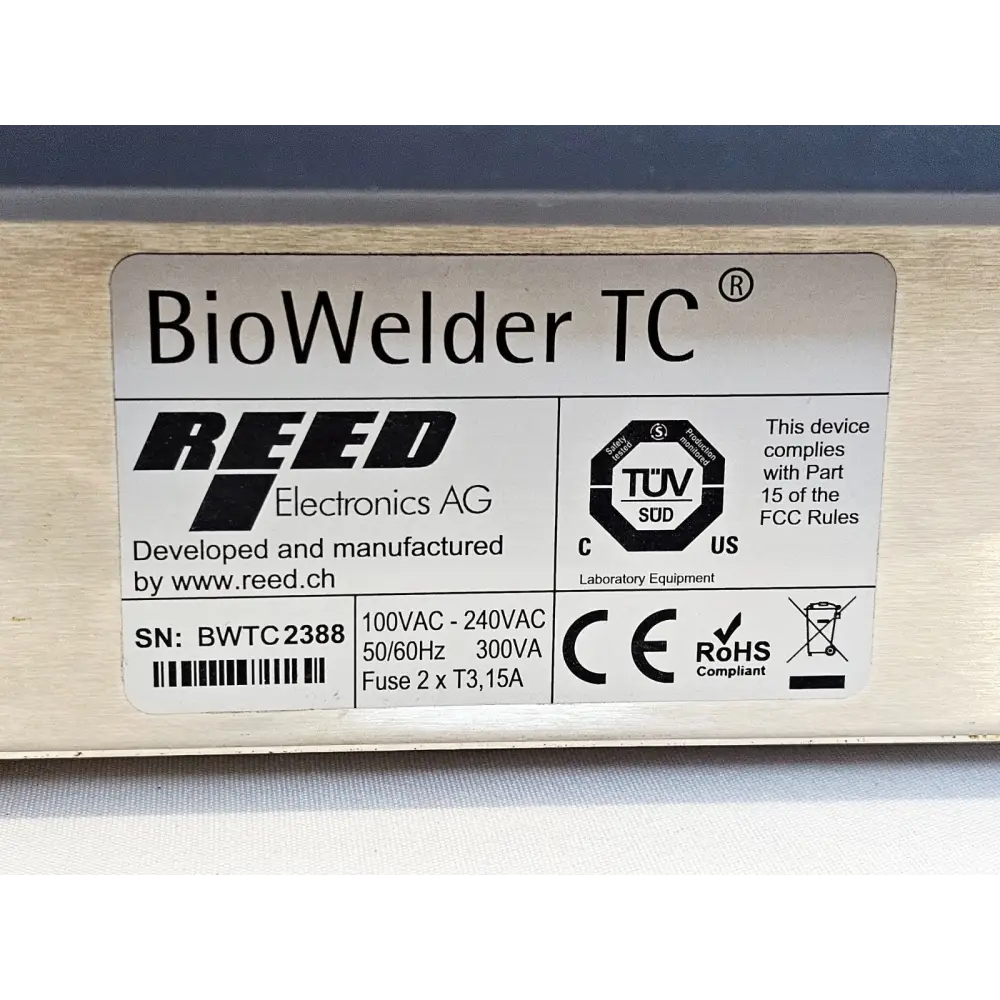 BioWelder TC serial number label BWTC2388 showing 100-240VAC 300VA rating, TÜV, CE and RoHS compliance markings